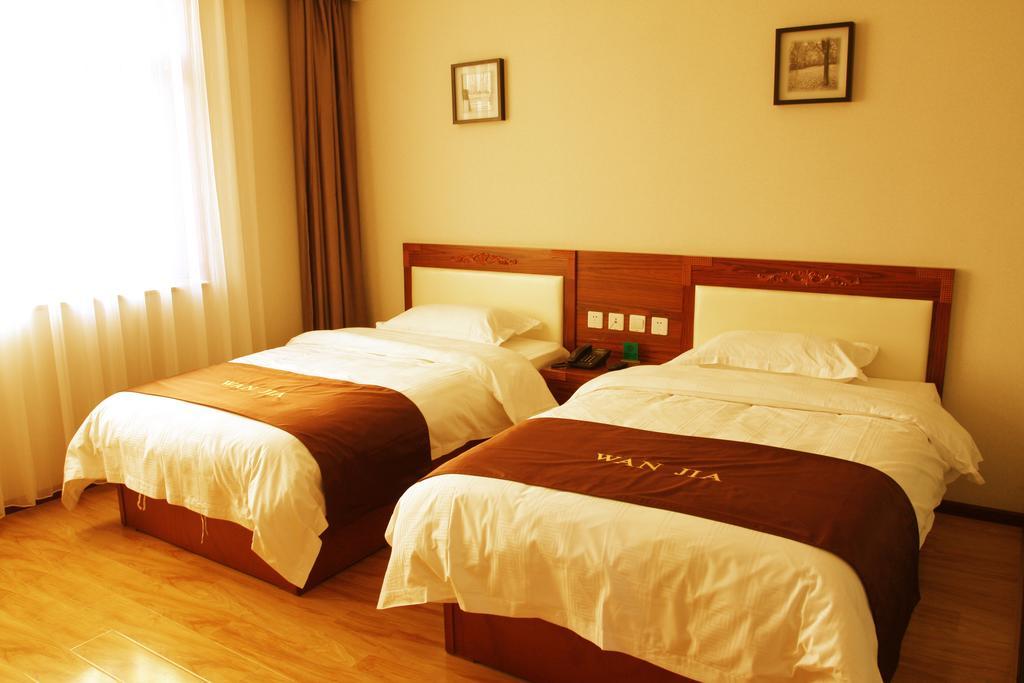Beijing Wanjia Business Hotel Sunji Szoba fotó